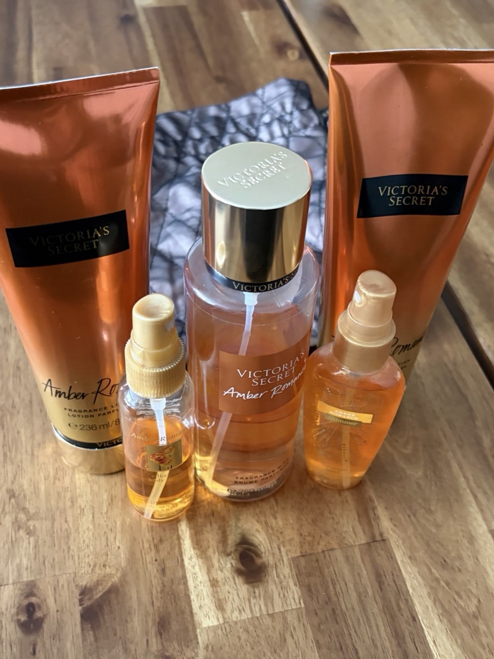 Victoria’s Secret Amber Romance 2-Body Lotions and 3-Fragrance Mists & Dust Bag